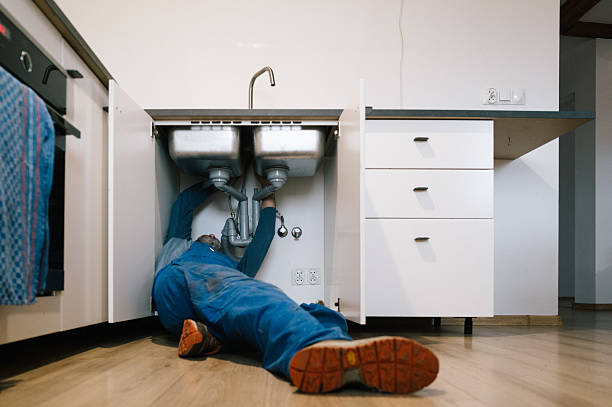Professional Drain Cleaning technician working in Buxton, OR